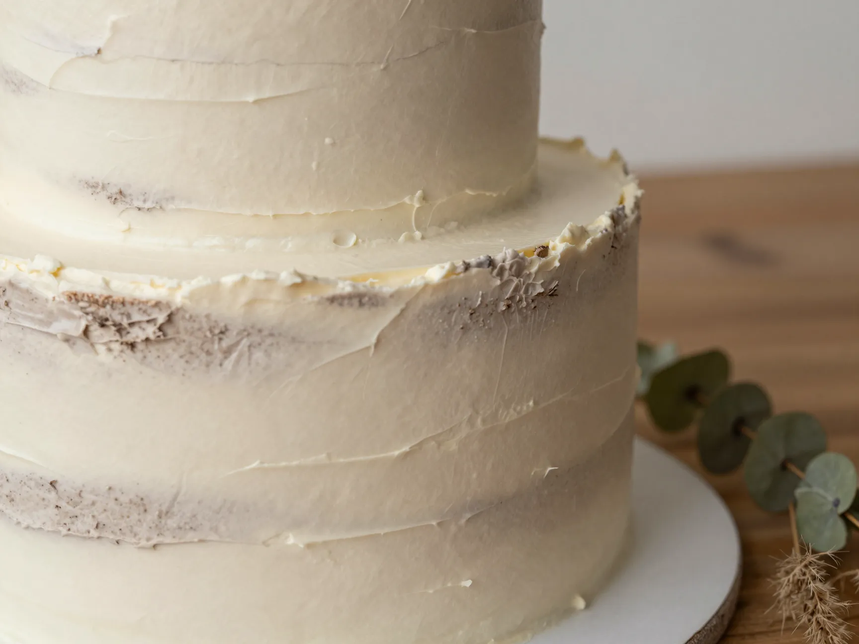 Earthy neutral organic buttercream cake with palette knife texture