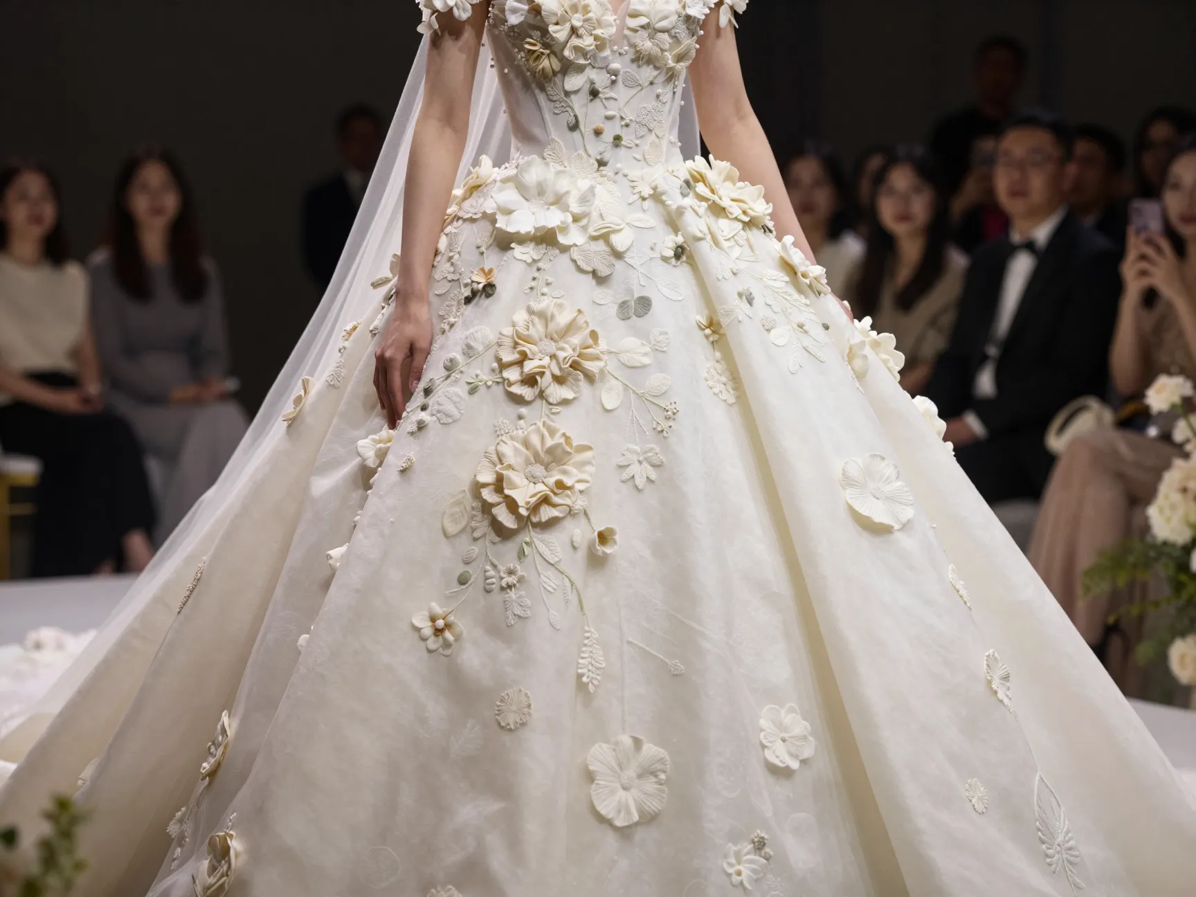 Ballgown with cascading three dimensional floral appliqués