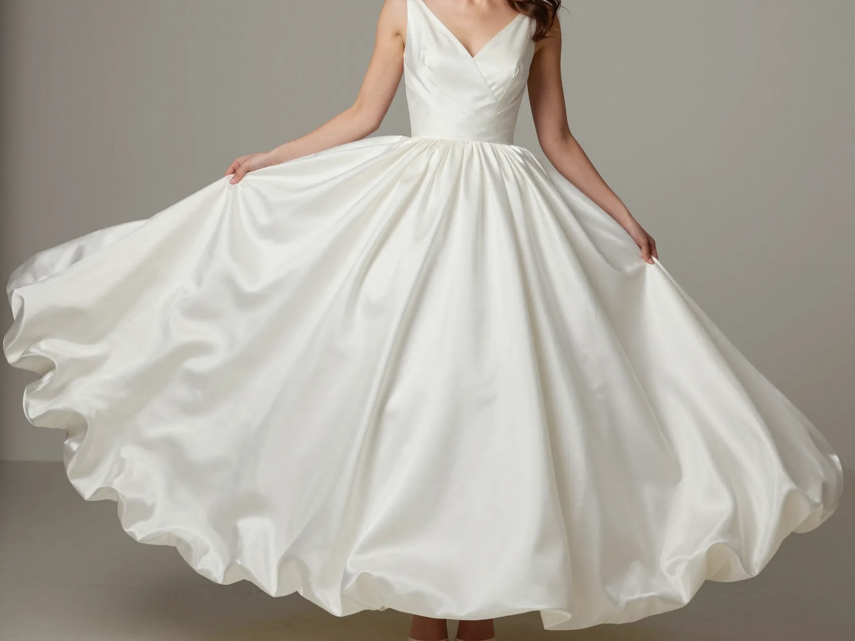 Bubble hem silk gown with gathered rounded skirt silhouette