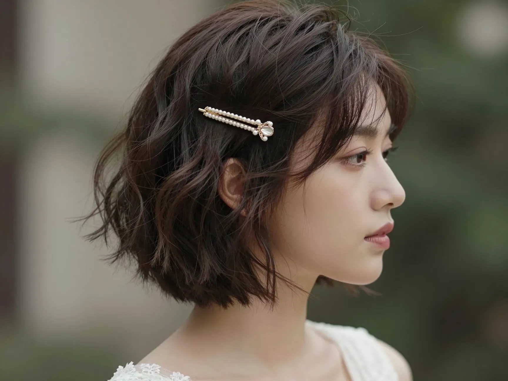 Textured french bob wedding hairstyle tousled vintage barette
