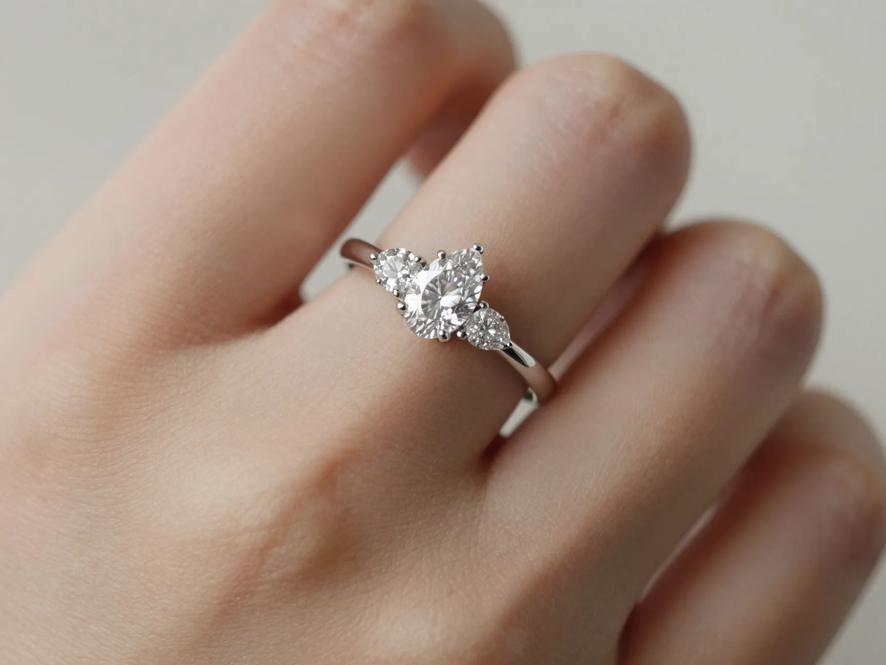 Toi et moi two stone ring with oval and pear diamonds