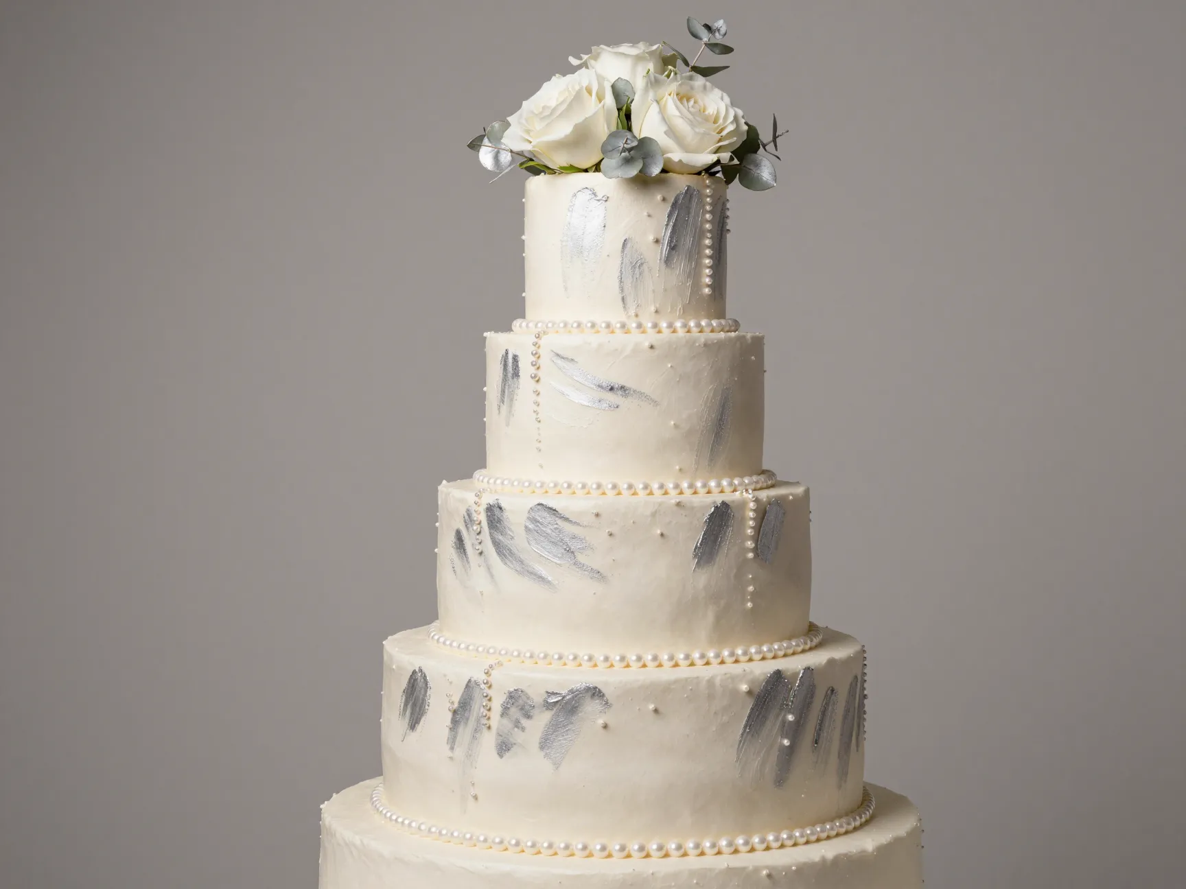 Silver anniversary cake pearl accents soft metallic brushwork elegant tiers