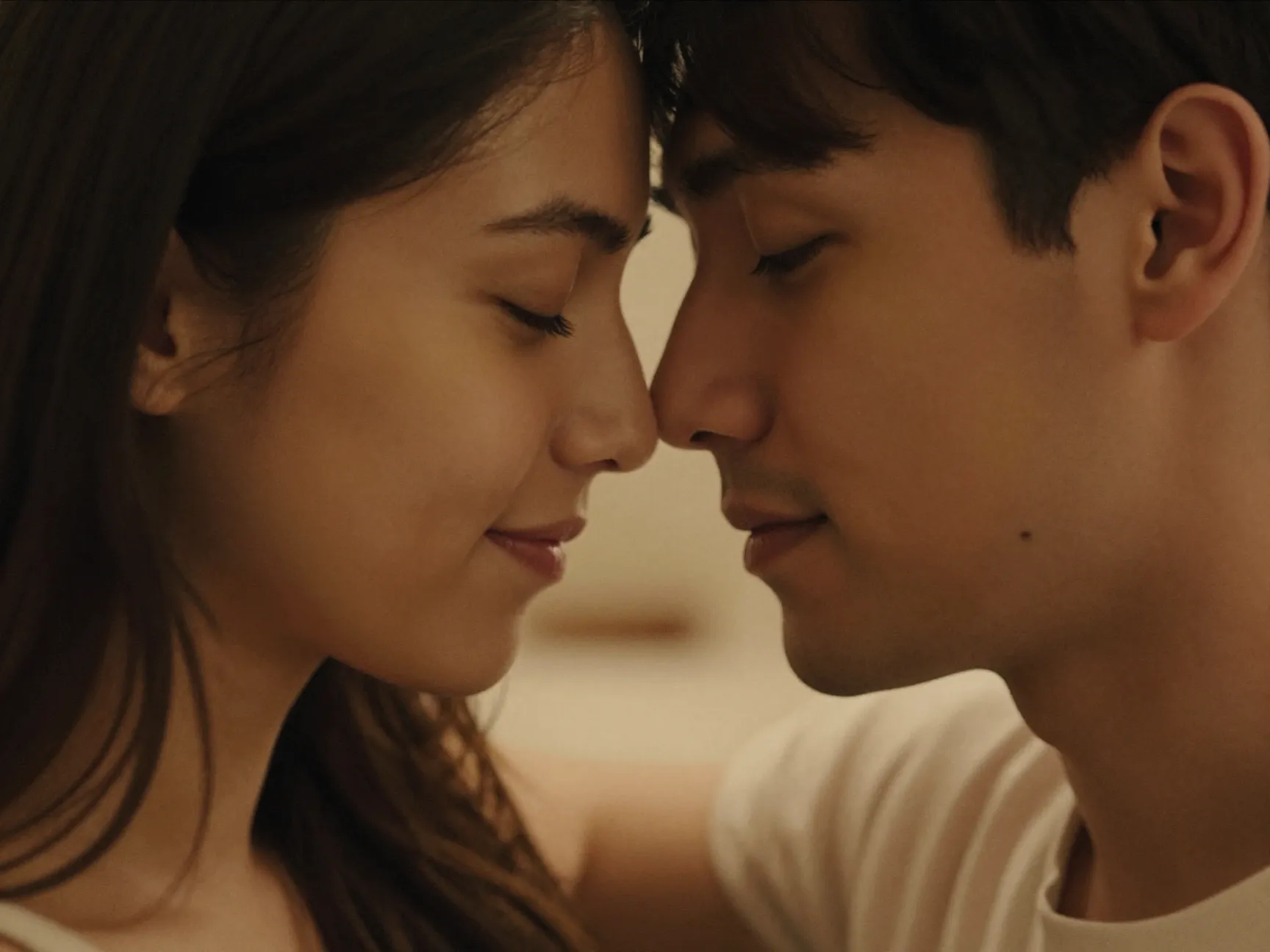 An intimate couple portrait with warm and personal romantic feeling