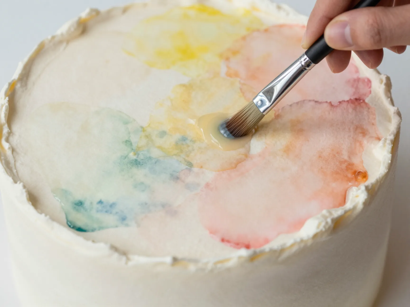 Watercolor effect cake with soft blended gel food coloring washes