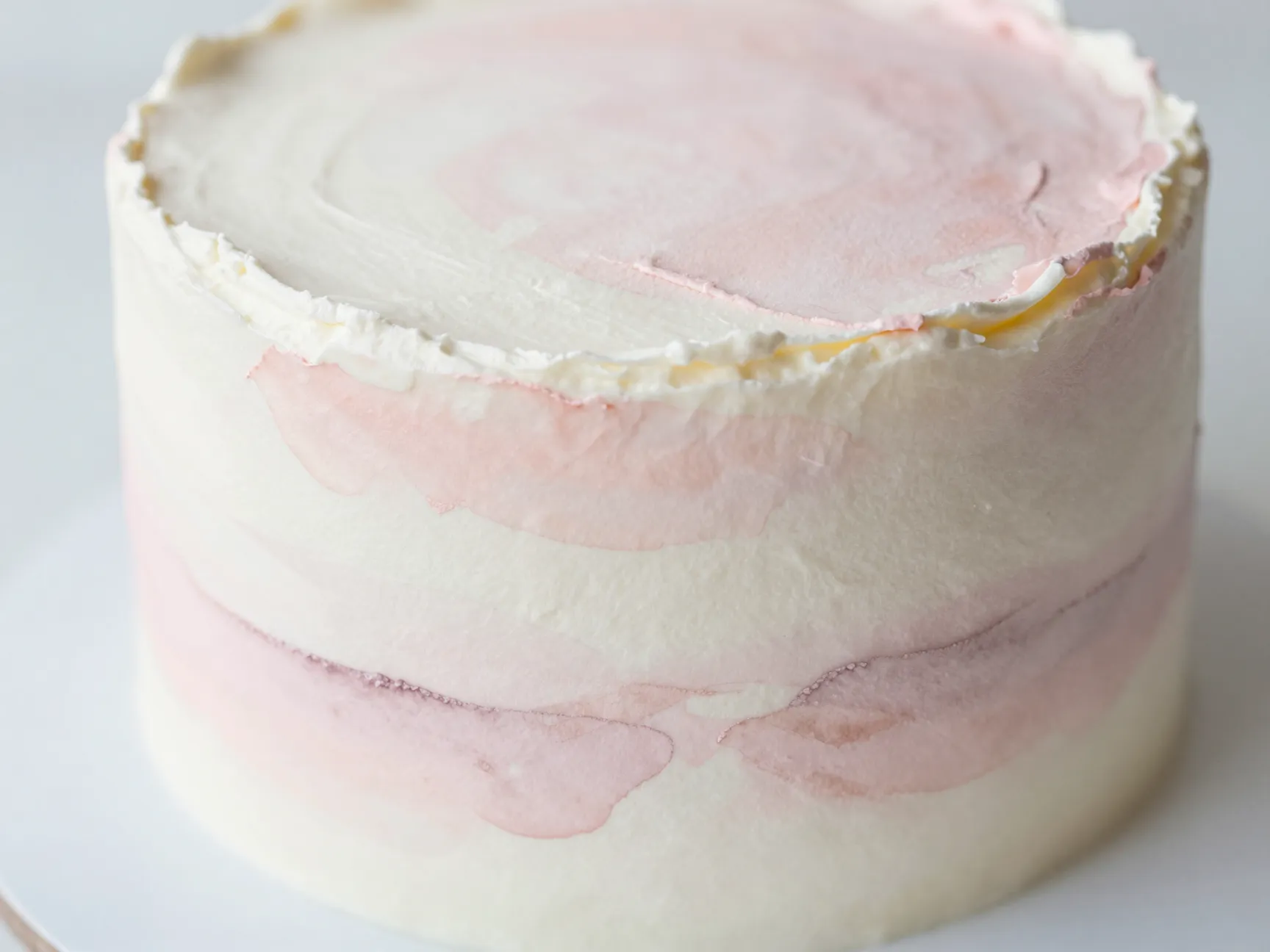 Watercolor buttercream cake blush pink mauve abstract strokes