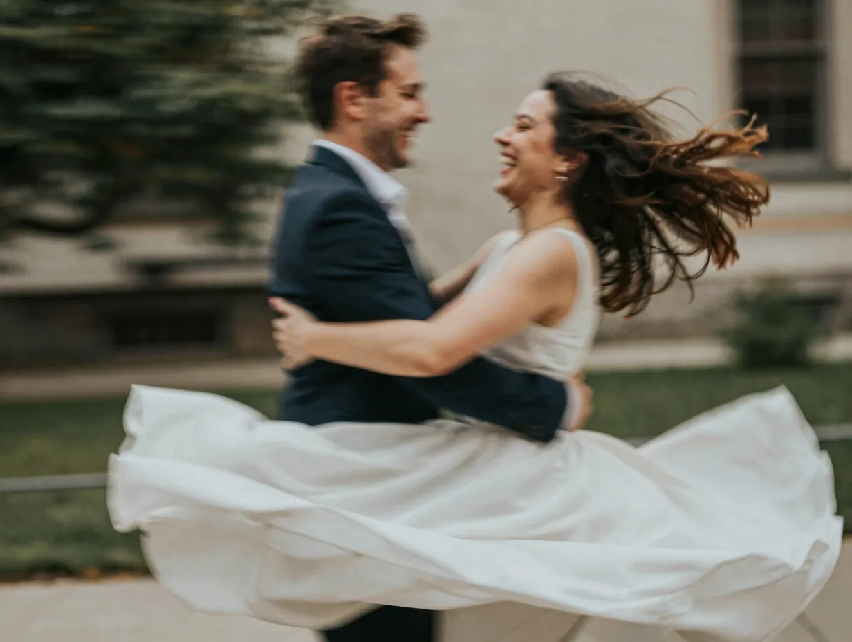 Motion blurred couple spinning laughing motion based framing