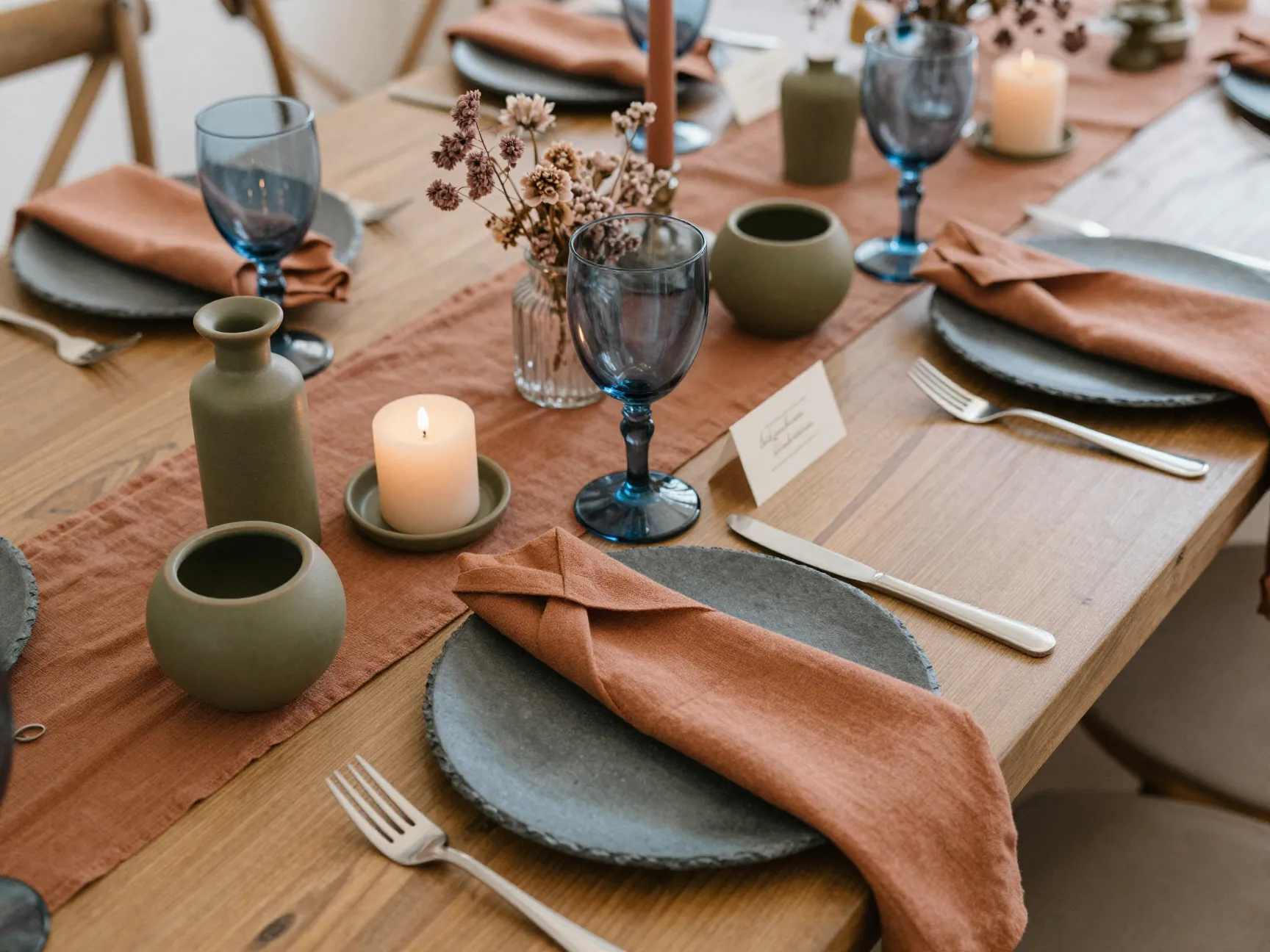 Terracotta olive ochre slate mauve earthy wedding table setting
