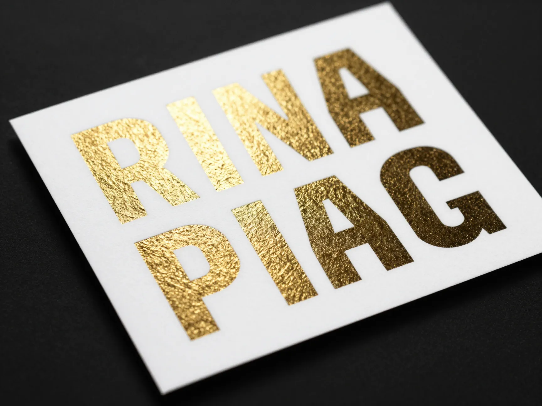 Laser printed invitation with gold foil effect on bold text