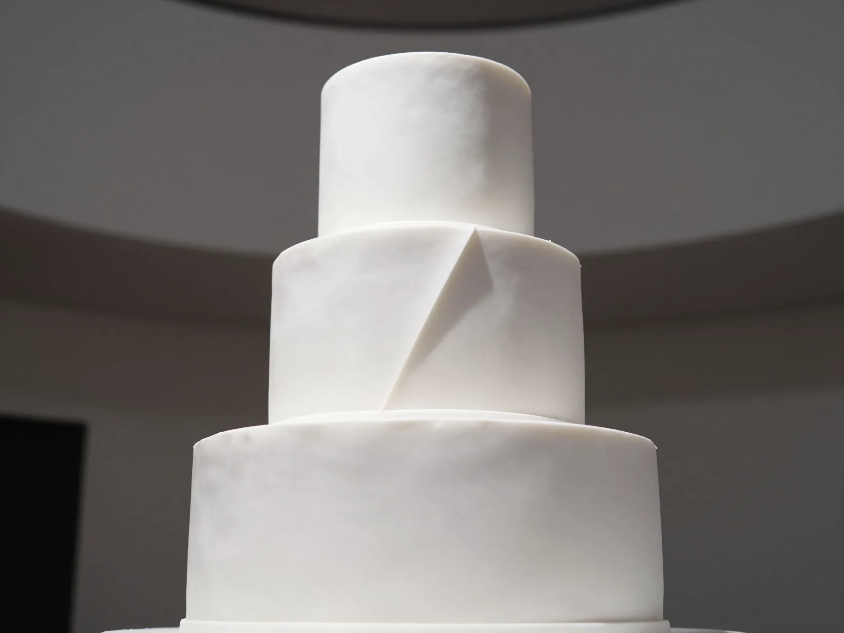 Sculptural asymmetrical statement contemporary art cake