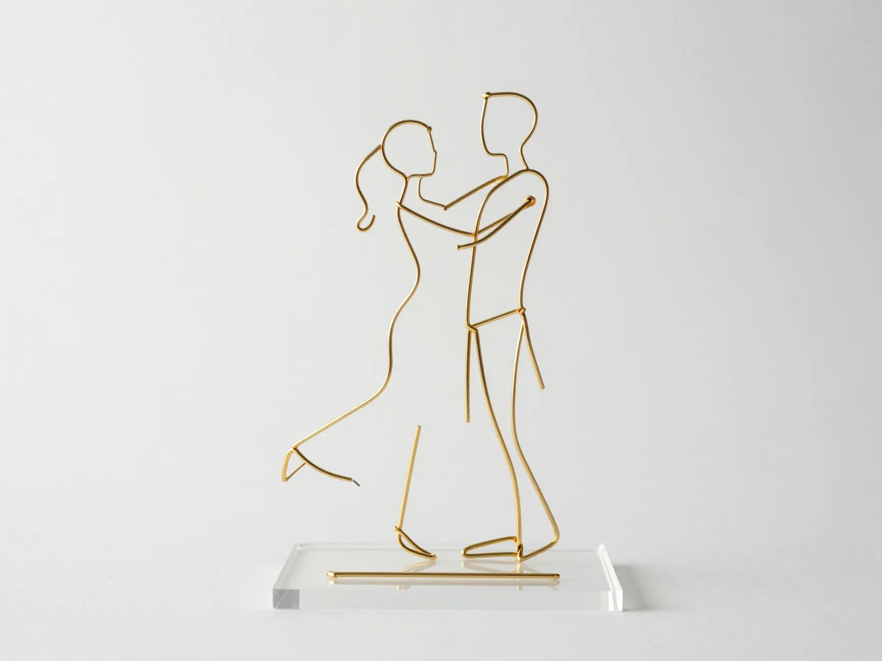 Minimalist gold wire sculpture abstract dancing couple topper