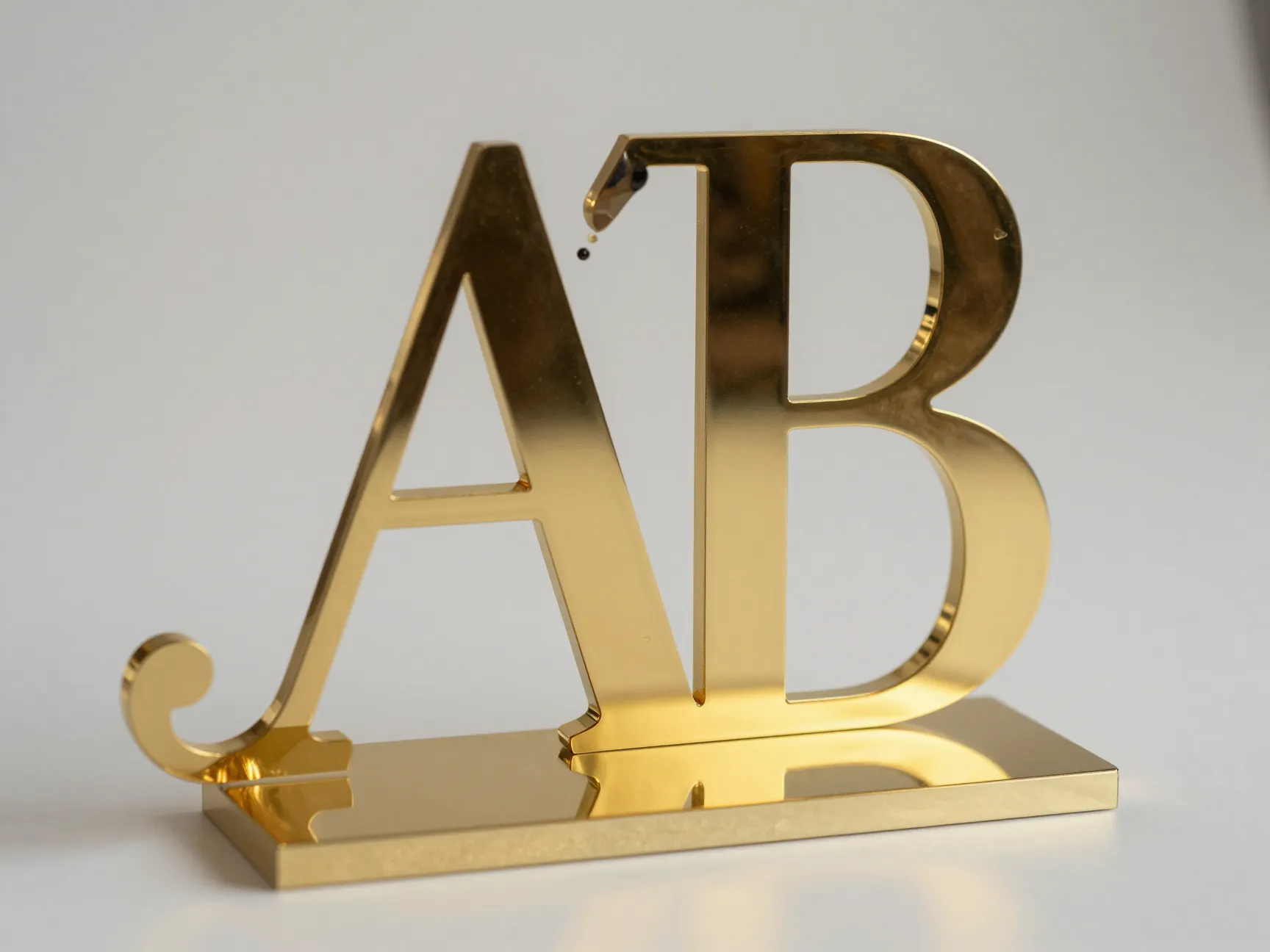 Engraved gold mirrored acrylic intertwined monogram topper