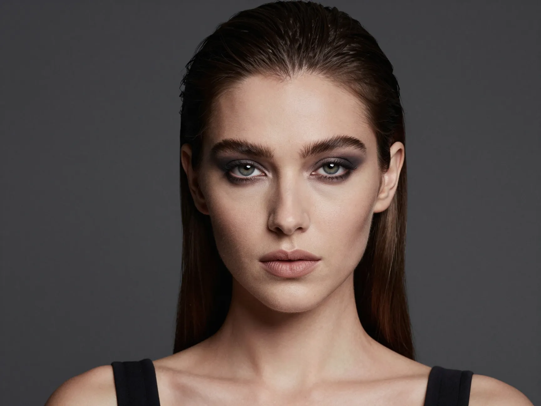 Sleek straight hair smoky eye black tie wedding