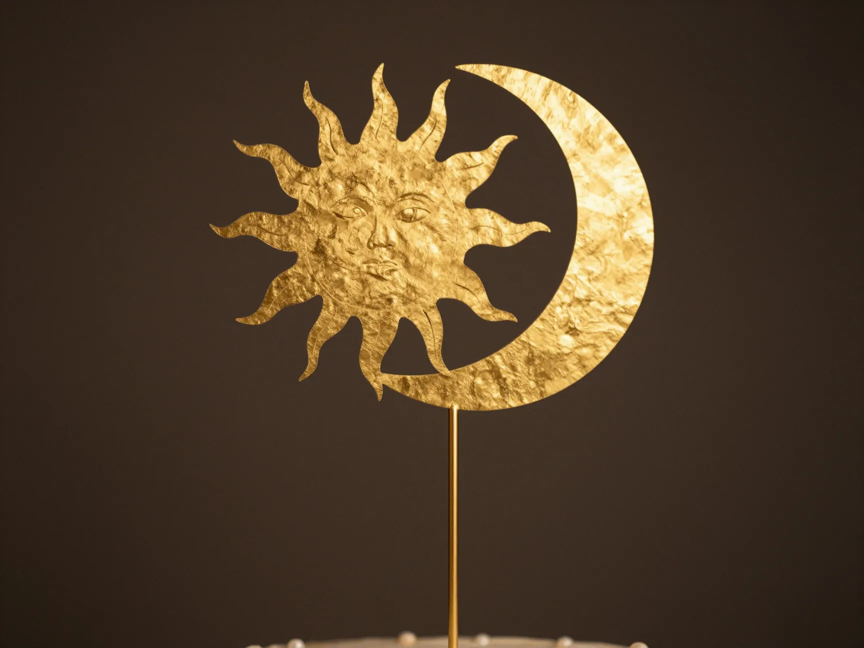 Celestial gold metal sun and moon cutout cake topper