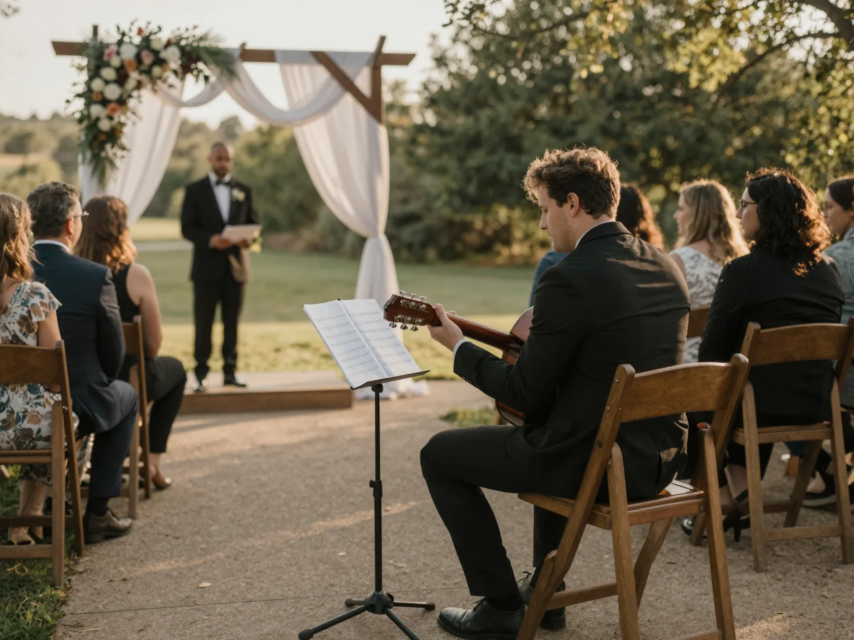 Live musician playing acoustic guitar for ceremony processional