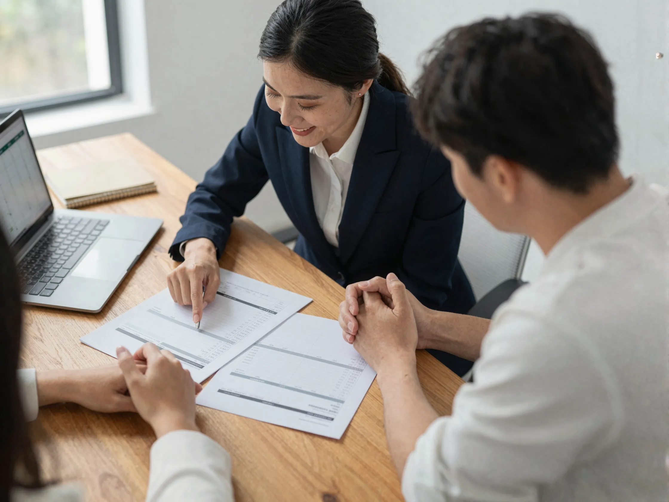 Hiring wedding planner first couple budget meeting office setting