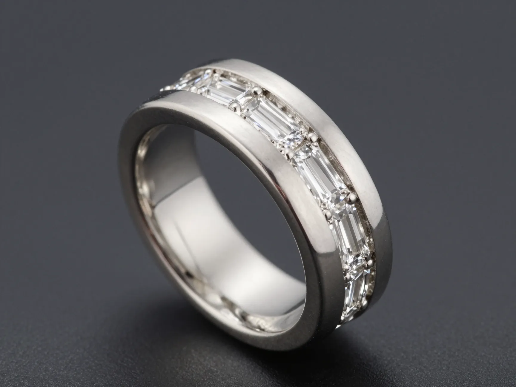 Wide architectural wedding band with channel set baguette diamonds