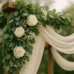 How to Decorate a Wedding Arbor with Flowers, Fabric, and Greenery
