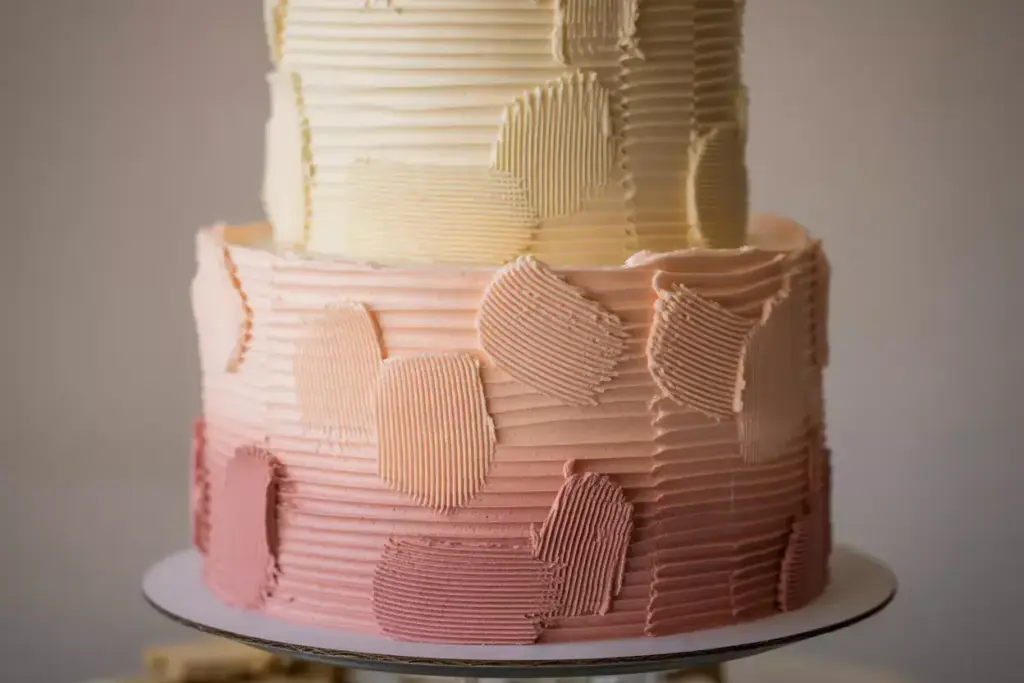 Textured buttercream wedding cake with ombre effect