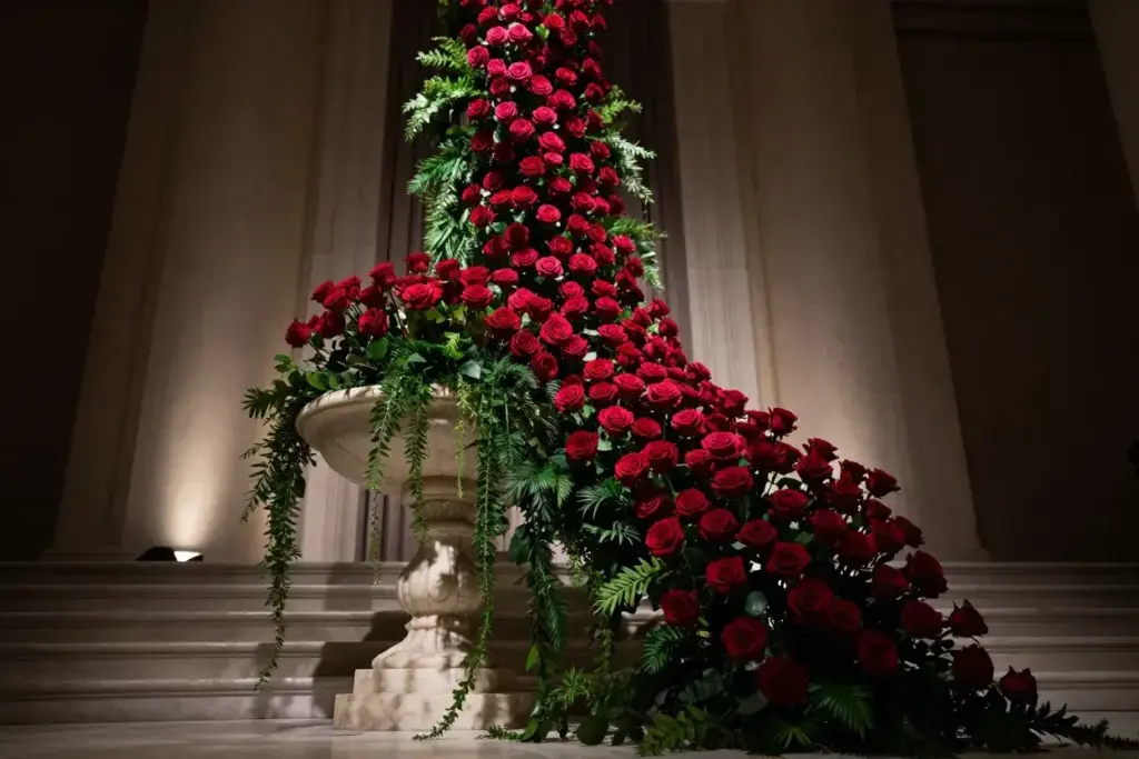 Classic cascade waterfall roses on pedestal with lighting