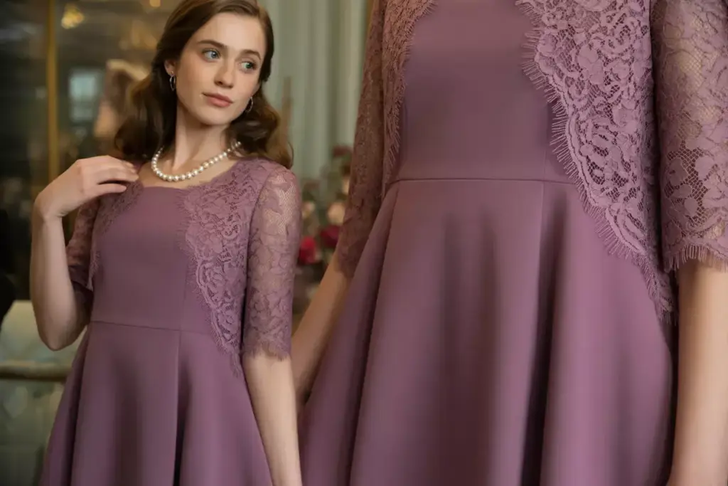Elegant woman in plum a line dress with delicate lace sleeves