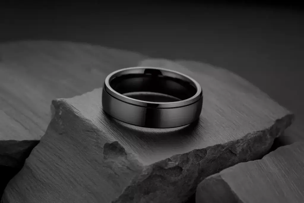 Black titanium wedding band matte finish industrial elegance studio