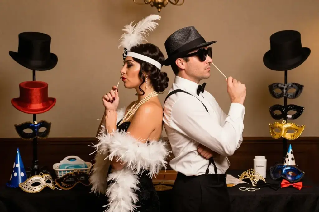 Guests wearing vintage themed hats and glamorous costume accessories