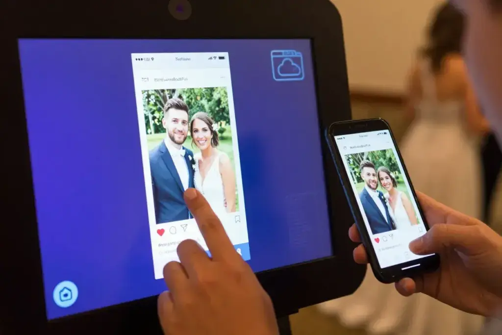 Guest sharing selfie booth photo instantly to social media via touchscreen