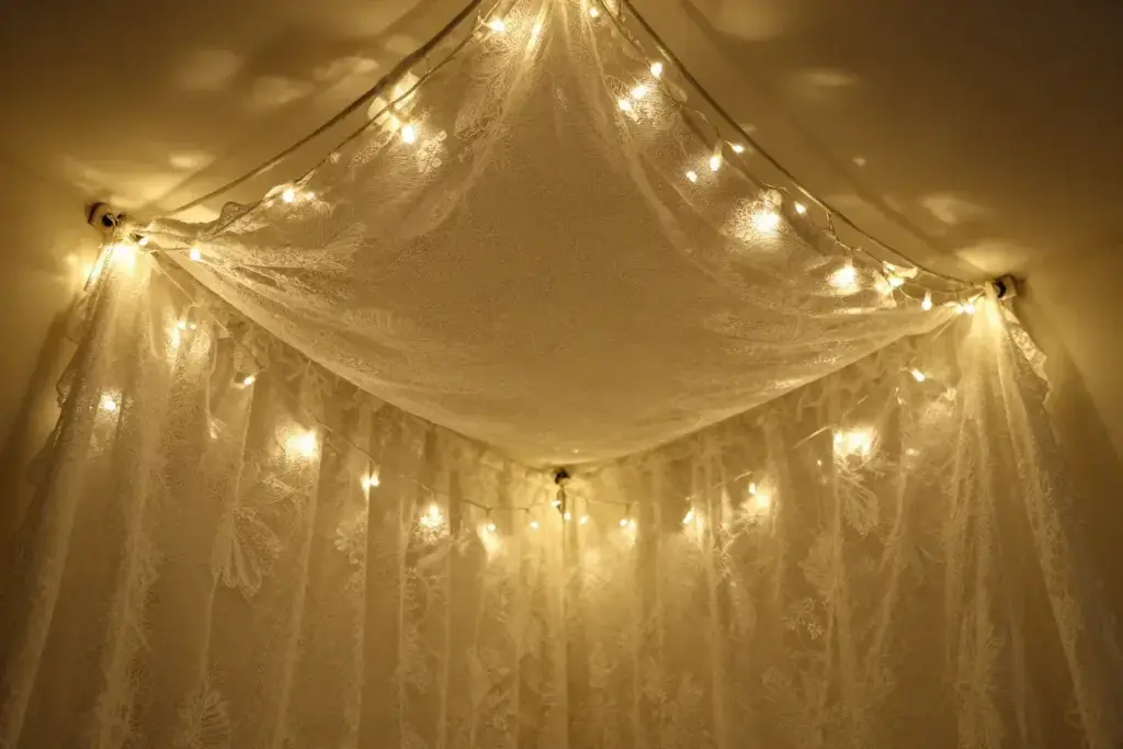 Vintage sheet fairy light canopy magical overhead lace illumination
