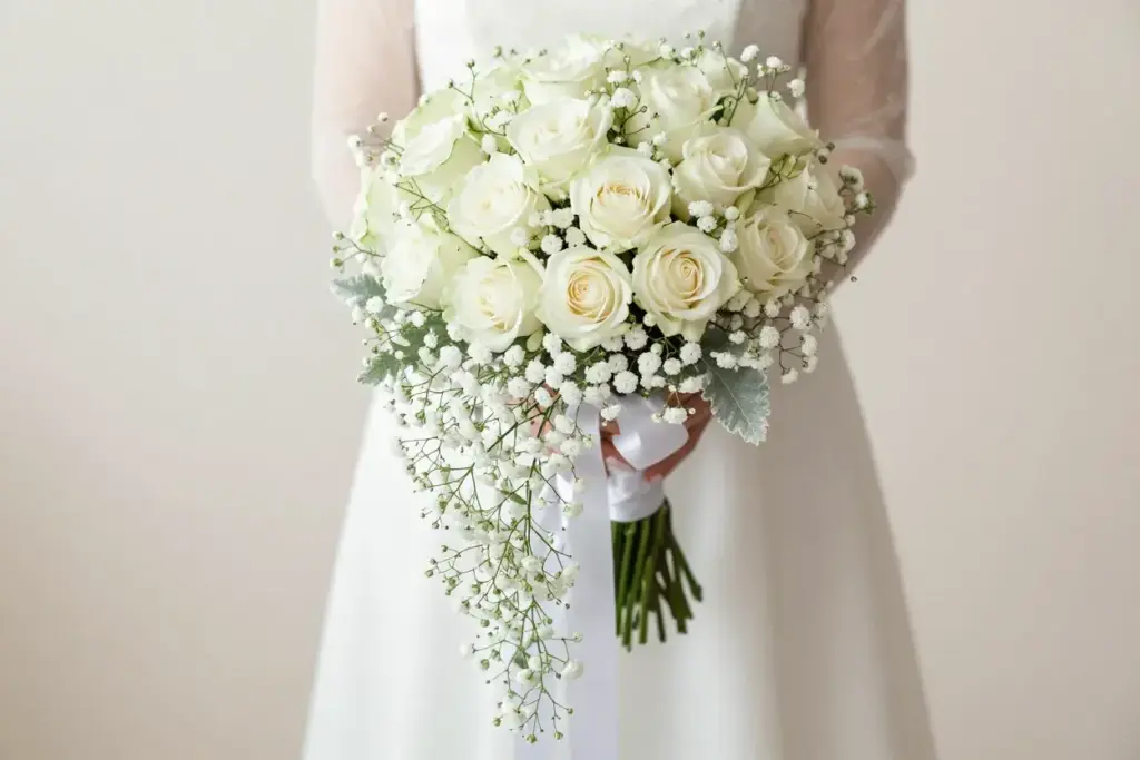 Classic white rose babys breath cascade bouquet formal wedding