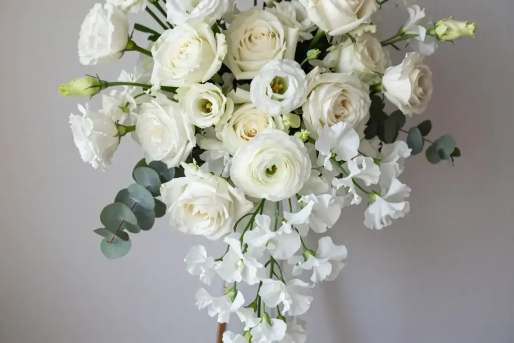 Mixed white blooms cascade textured monochromatic masterpiece