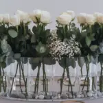 7 Dramatic Wedding Centerpieces Using Tall Vases That Will Transform Your Reception