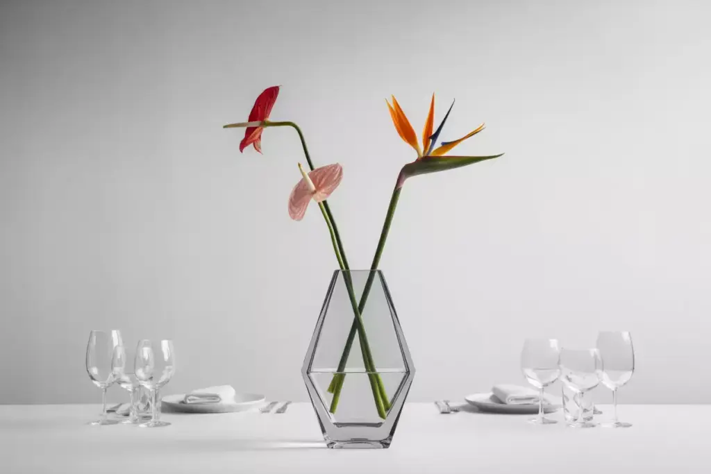 Geometric glass vase with single variety anthuriums