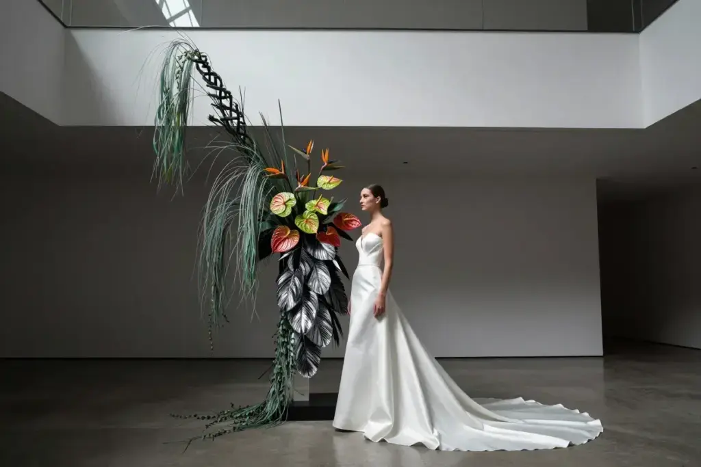 Asymmetrical sweep bouquet in modern minimalist venue