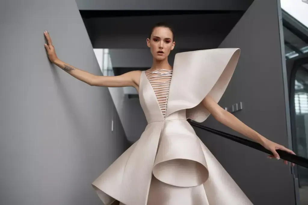 The contemporary statement dress geometric cutouts modern