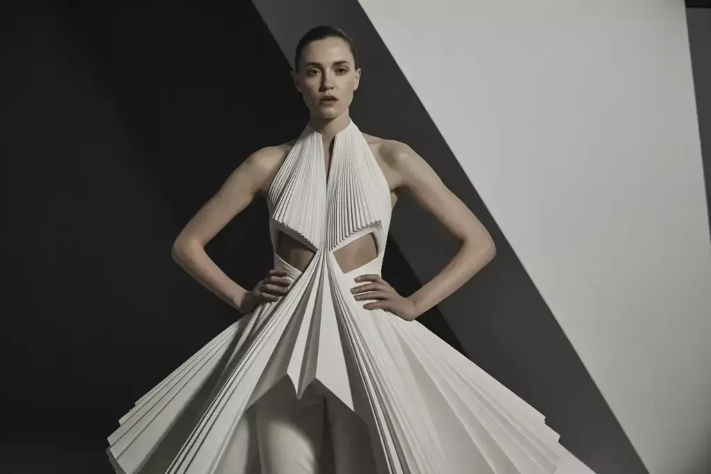 The high fashion halter with architectural pleating