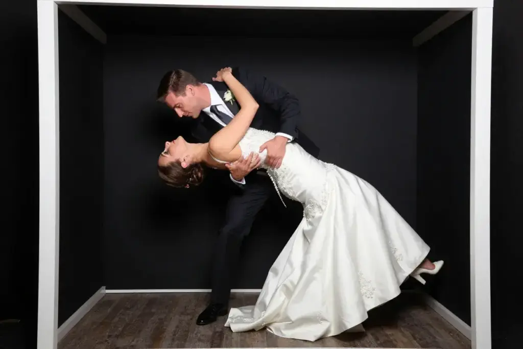 The classic dip groom bride elegant hollywood photobooth pose