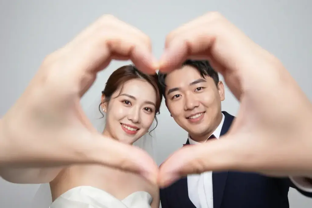 The hand heart couple forming heart with hands photobooth