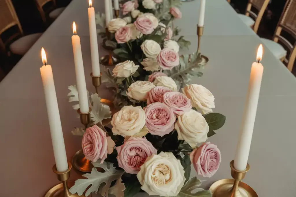 Eyelevel garden roses taper candles brass holders dusty miller vintage centerpiece