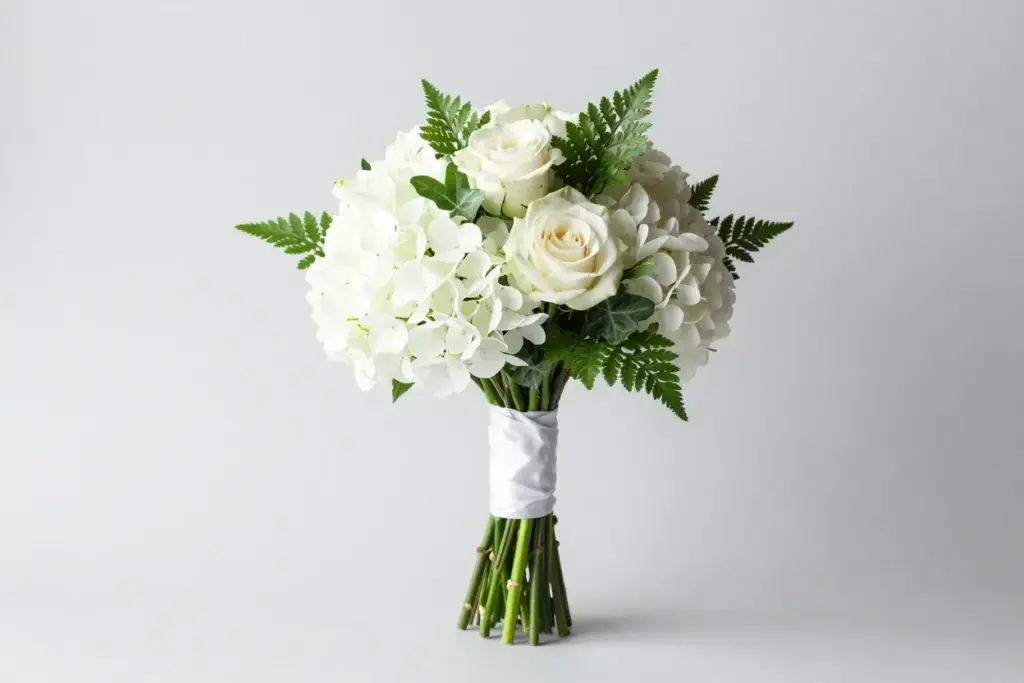 Minimalist white green bouquet hydrangeas roses clean ribbon