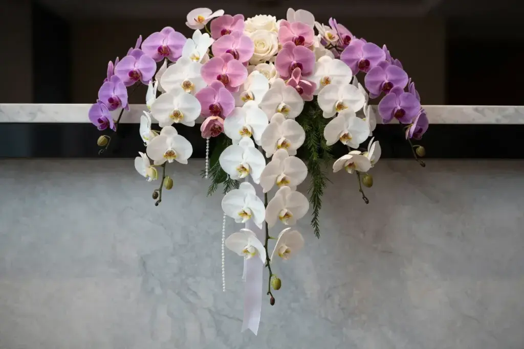 Exotic cascading orchid bouquet modern luxury wedding