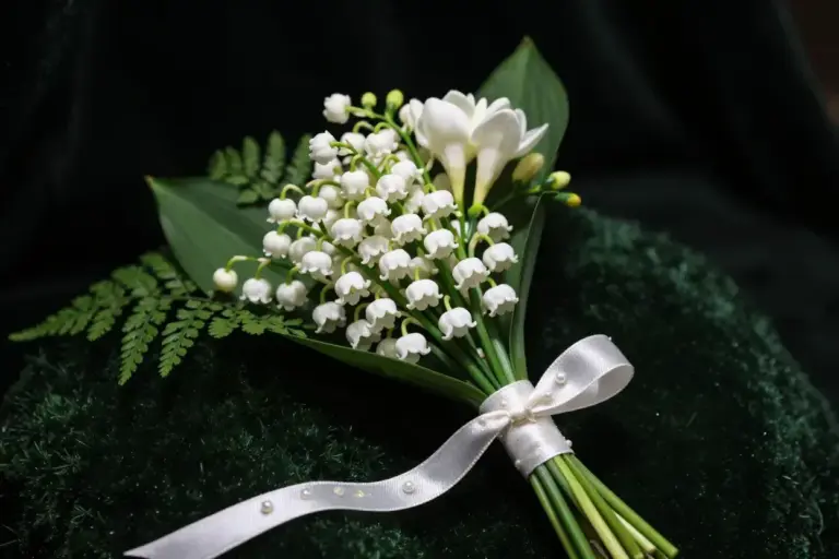 Macro Detail Of Lily Of The Valley Bouquet With Pearl Ribbon