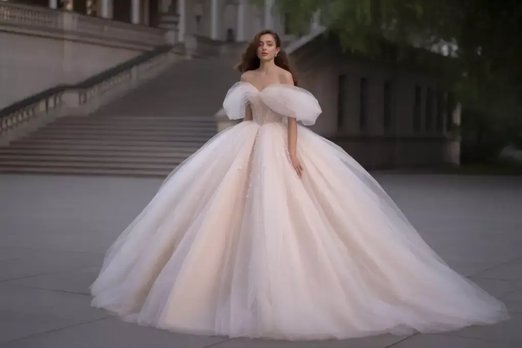 Ethereal tulle princess ballgown with pearl beaded sleeves
