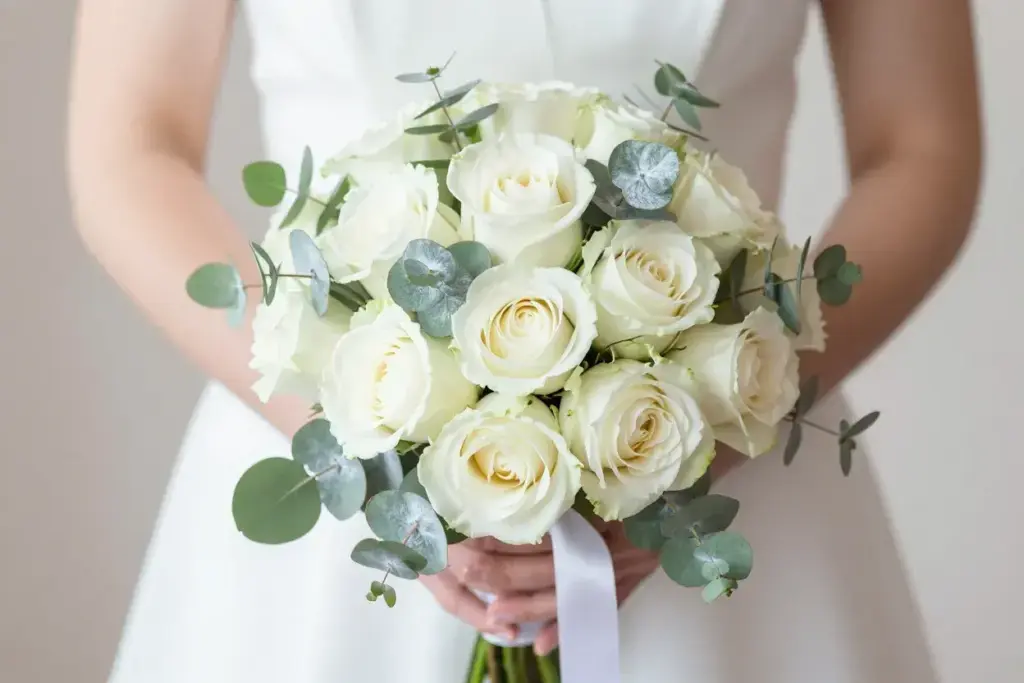 Classic white rose eucalyptus bouquet with ivory ribbon