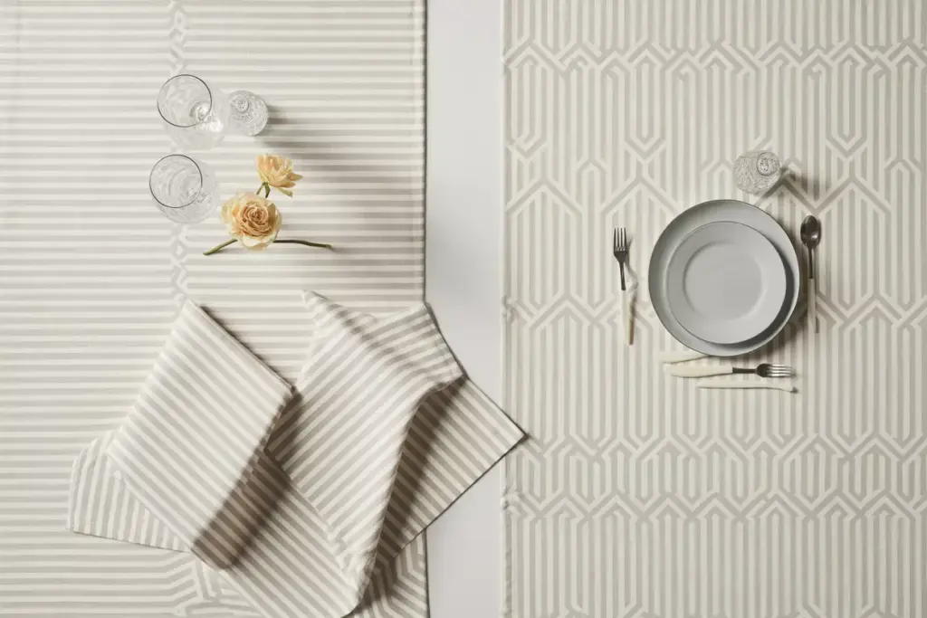 Modern geometric pattern table runner with minimalist place setting