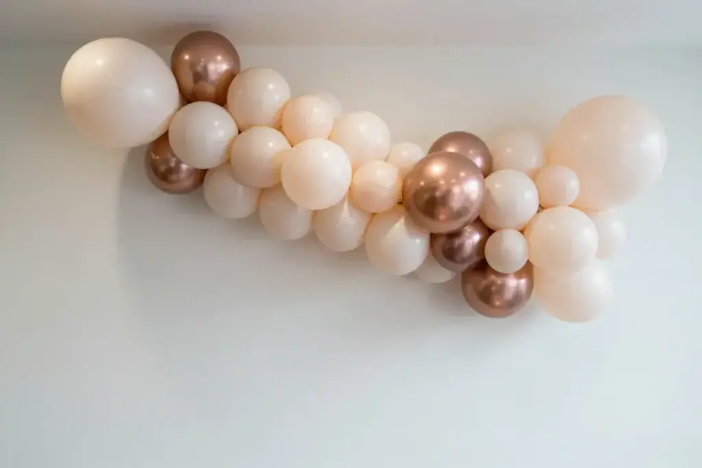Organic balloon garland with matte balloons and metallic accents