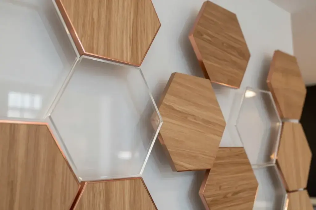 Geometric hexagonal panels with wood and metallic accents