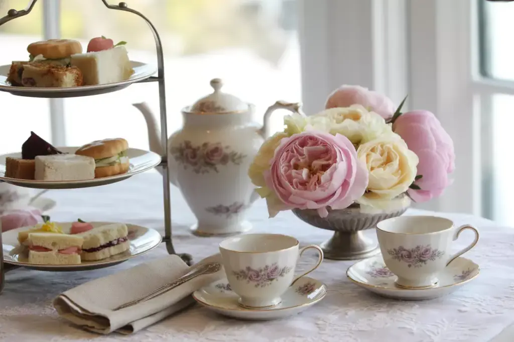 Classic tea party table with tiered stand china and peonies