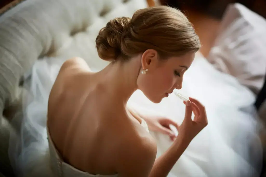 Romantic low chignon at nape with strapless wedding dress back