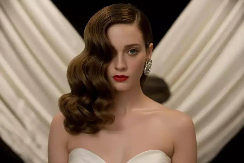 Glamorous hollywood side swept waves with strapless mermaid gown