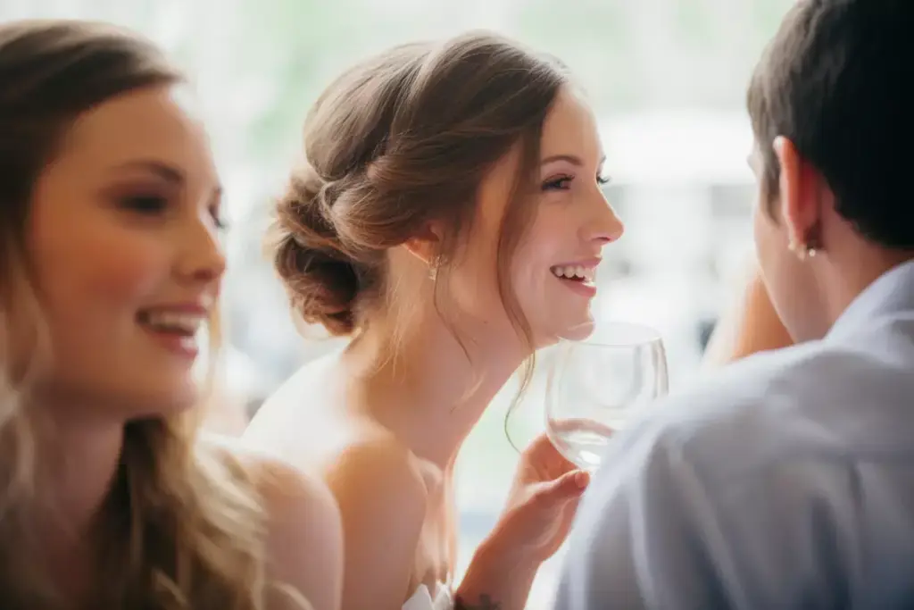 Effortless loose romantic updo with face framing tendrils strapless